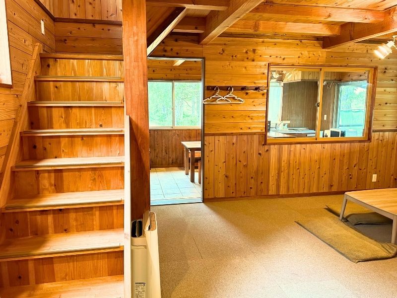 Wooden staircase leading to the loft inside the cotage